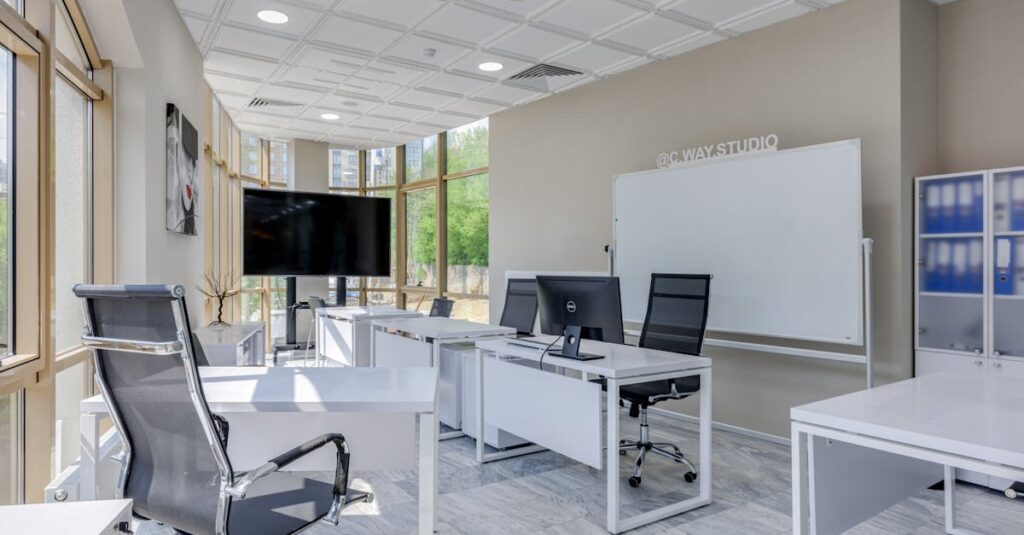 Spacious and bright modern office interior with sleek furniture, ideal for professional workspaces.